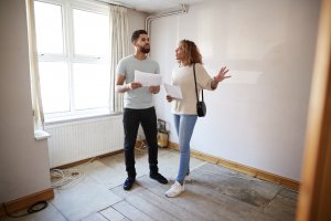 couple looking at house to buy, buying real estate concept