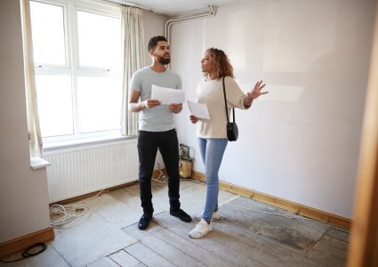 couple looking at house to buy, buying real estate concept