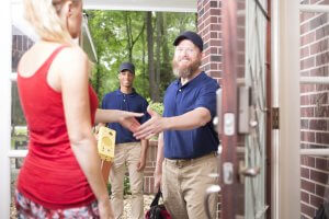 Workers arriving at a house for a home inspection