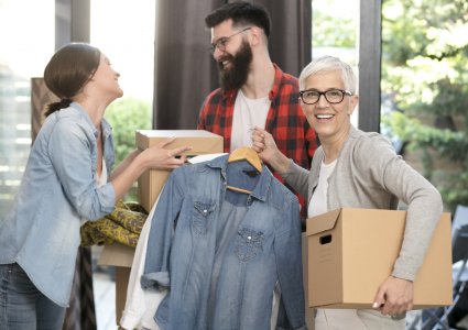 A family moving boxes on moving day