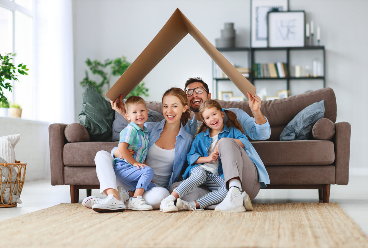 Happy family in their new home and neighborhood