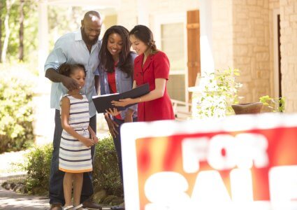 Happy family buying a new house, owning a home concept